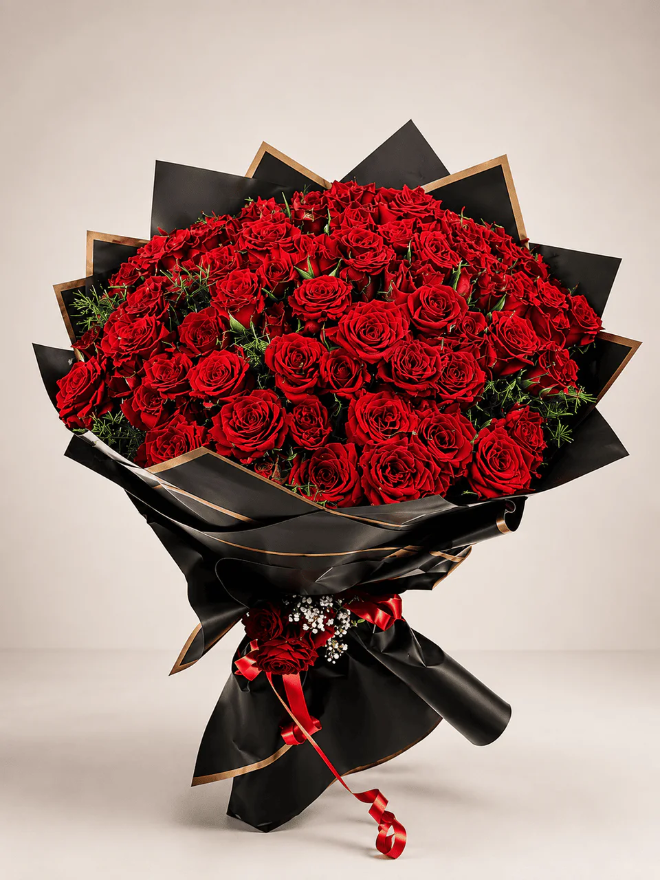Royale luxury red rose bouquet with black and gold wrapping for flower delivery in Tangier